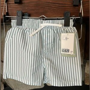 H&M boys green and white striped swim trunks size 18 months